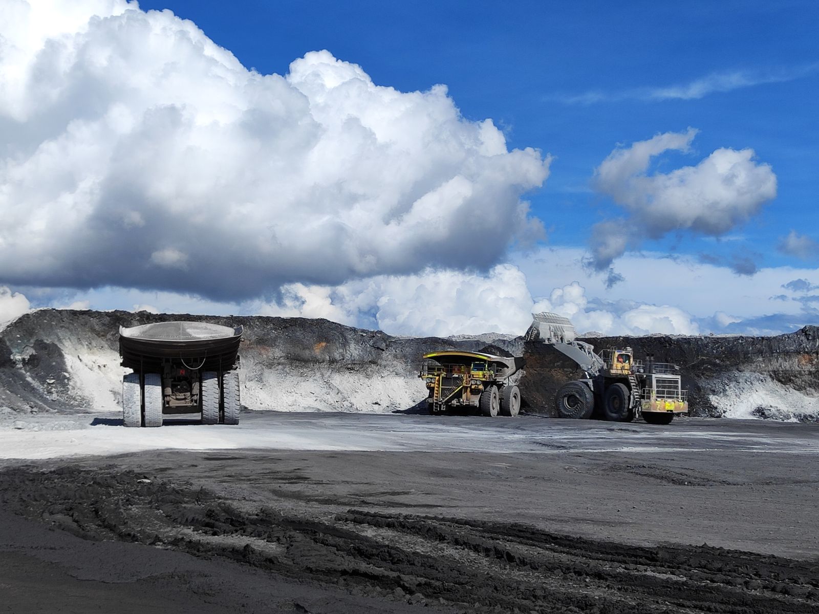 Heavy equipment working in an open-pit mine